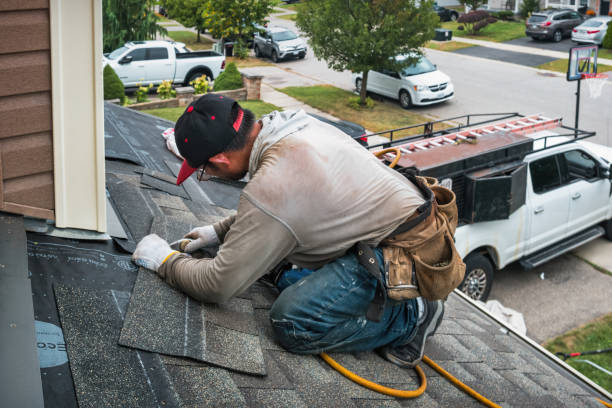 Professional Roofing technician working in Millersburg, PA